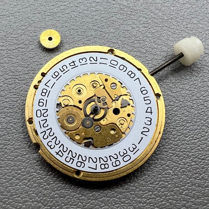 Swiss ETA255.412 quartz watch movement with 3 hands and white dial, precision craftsmanship by ETA.