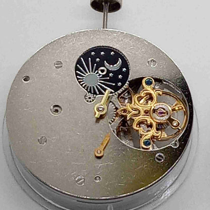 Silver big flywheel watch with mechanical movement and moonphase at 3 o'clock by China Made.