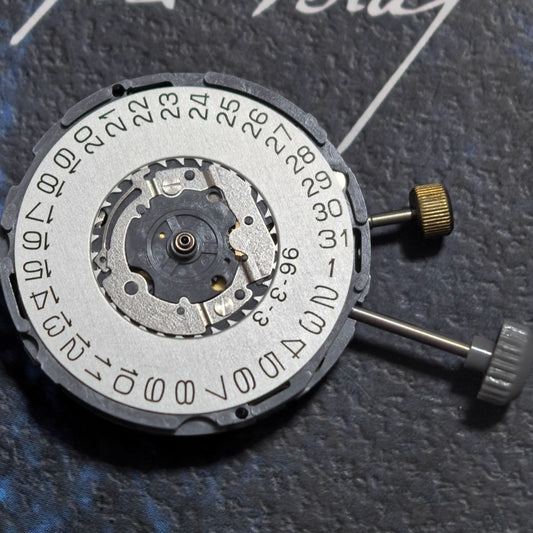 Miyota 6L76 quartz watch movement with 2-stem, 3-hand repeat alarm, and calendar date at 3 o'clock.
