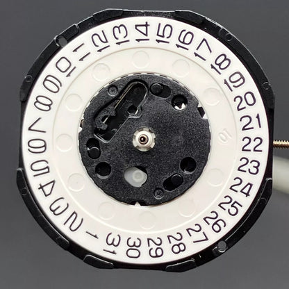 Set of 3 Z205 quartz watch movements with 3 hands and calendar date at 3, ideal for watch repairs.