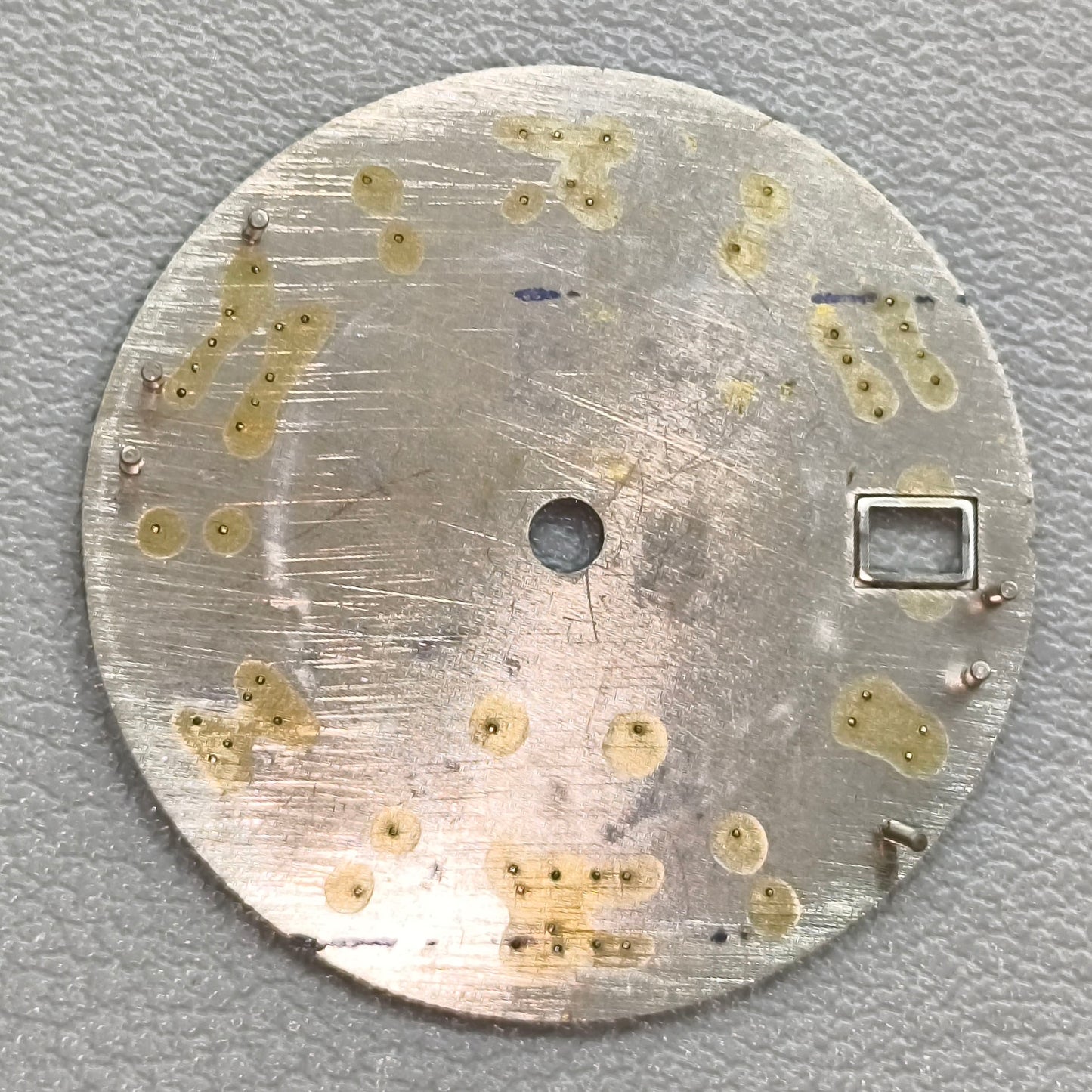 watch dial with S logo