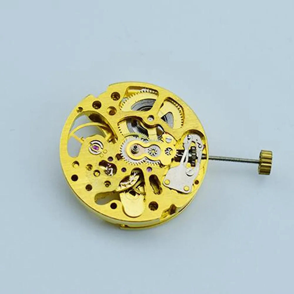 Gold 27mm 17-jewel skeleton automatic watch movement with pendulum adjustment by Radiation Pattern, 2004 model.