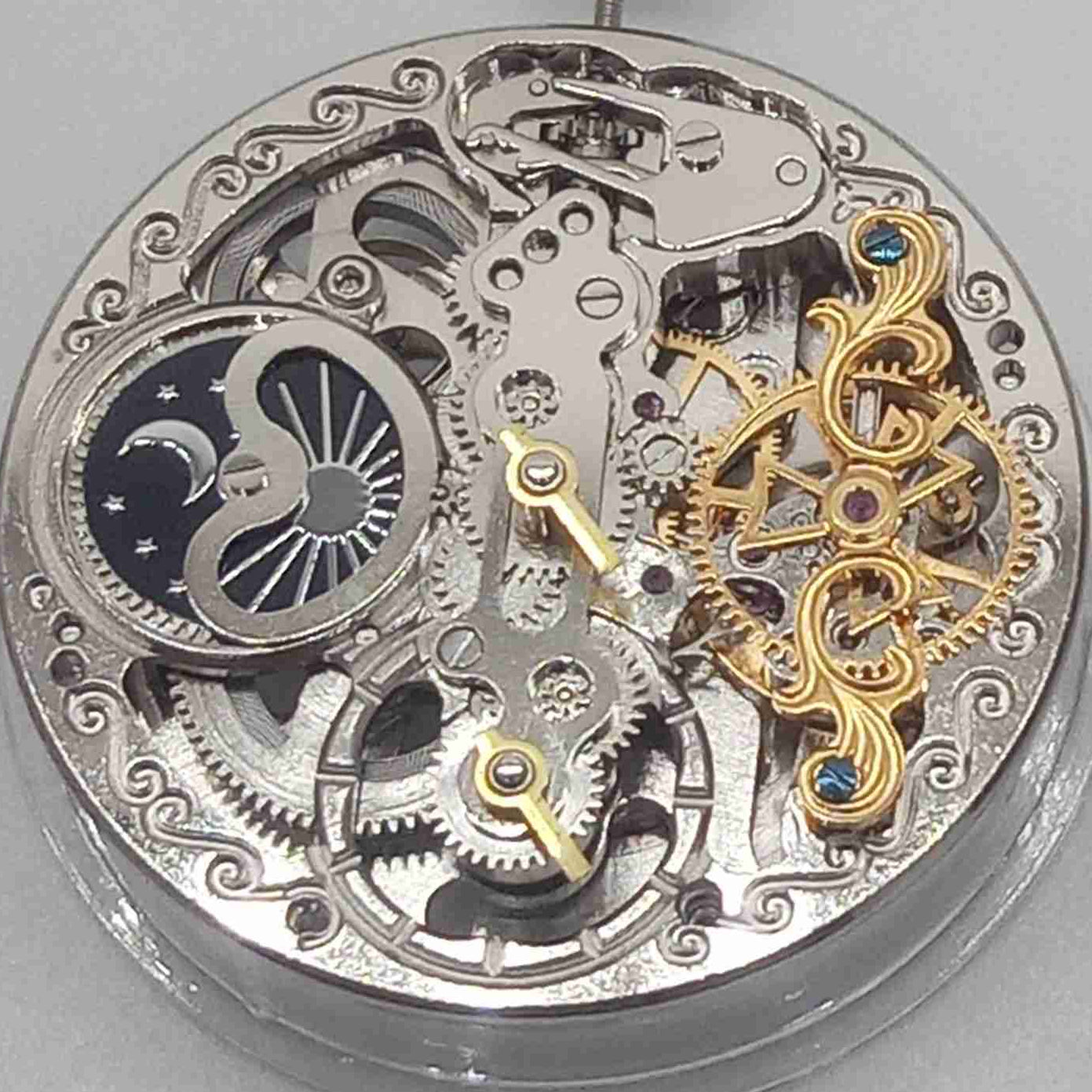 Veined hollow silver watch with mechanical movement and small second display at 6 o'clock, China-made.