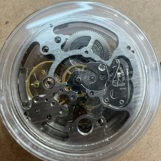 Silver hollow watch with 7120 automatic mechanical movement, 3 hands, large size - elegant timepiece.