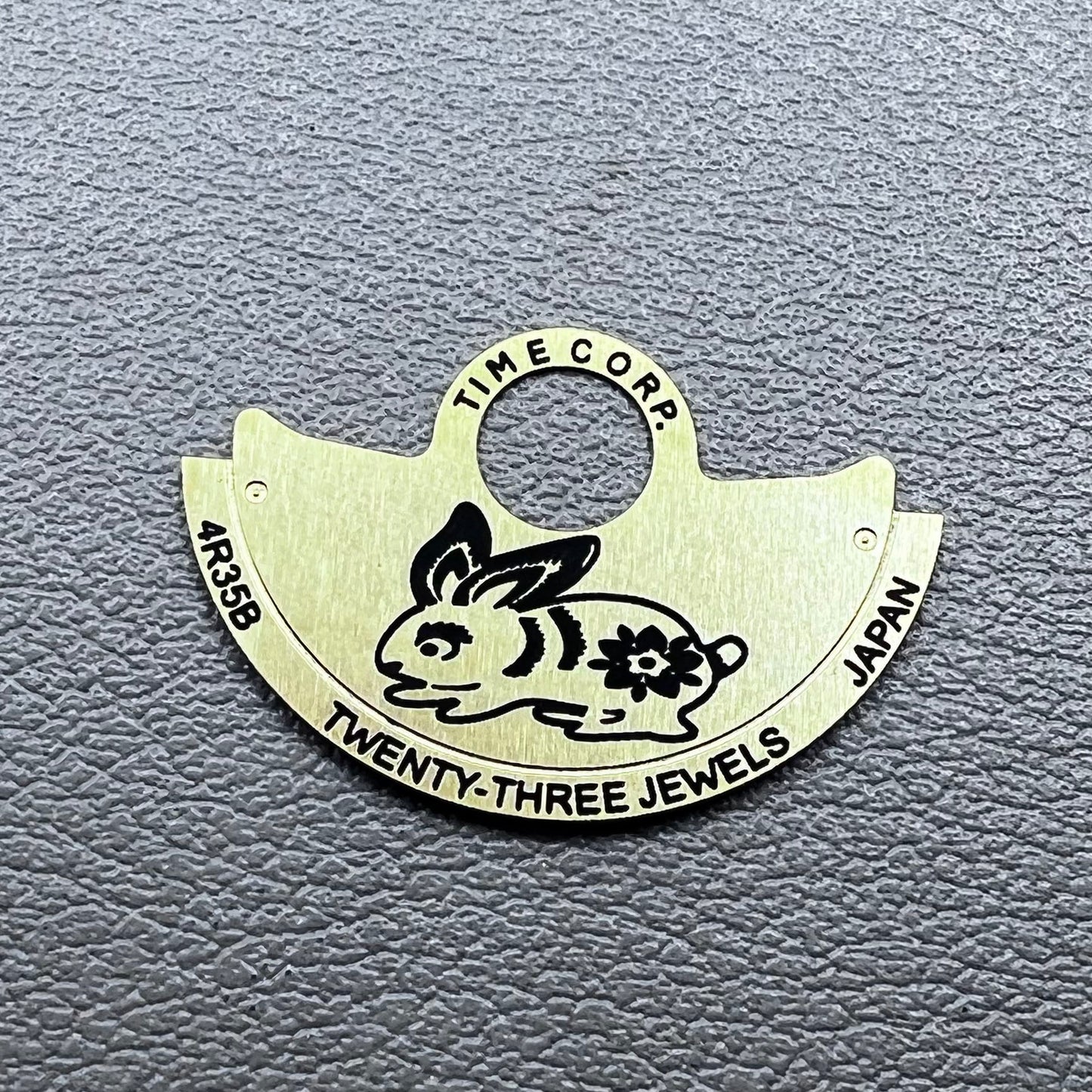 Golden Rabbit rotor overlay for NH35/NH36 4R35 movement, enhancing watch accessory aesthetics and brand style.