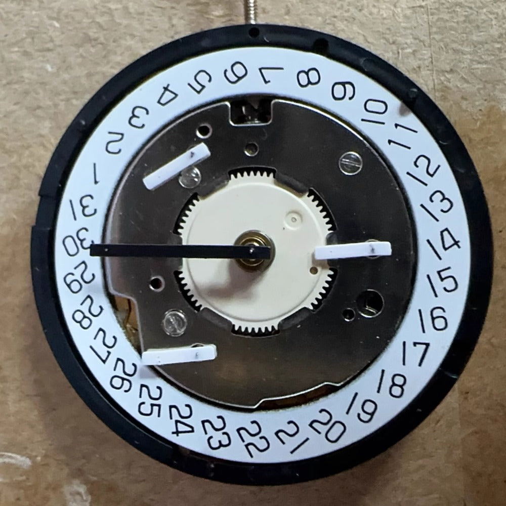 Swiss Made Golden ISA 8174 alarm clock with quartz movement, 6 hands, and sound pad for precise timekeeping.