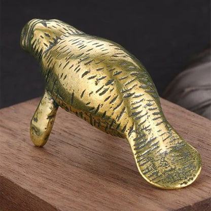 Hand-carved vintage bronze sea lion figurine, solid copper trinket for watch accessory display.