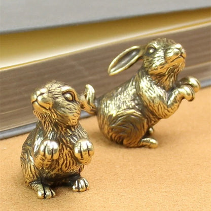 Solid copper rabbit figurine with vintage bronze finish, detailed hand-carved desk accessory.