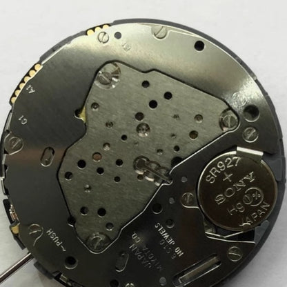 Black disk date watch part with Miyota 6S10 quartz movement, ideal for precision repairs.