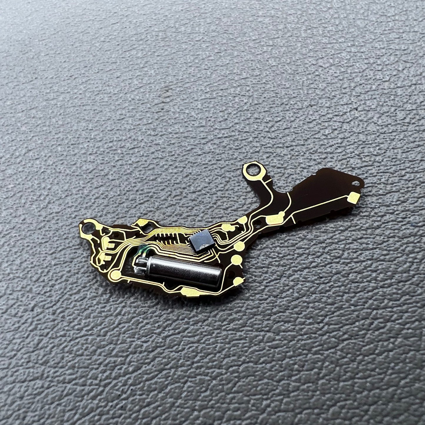 Hattori VR33 quartz movement circuit board for precise watch accessory repair and replacement.