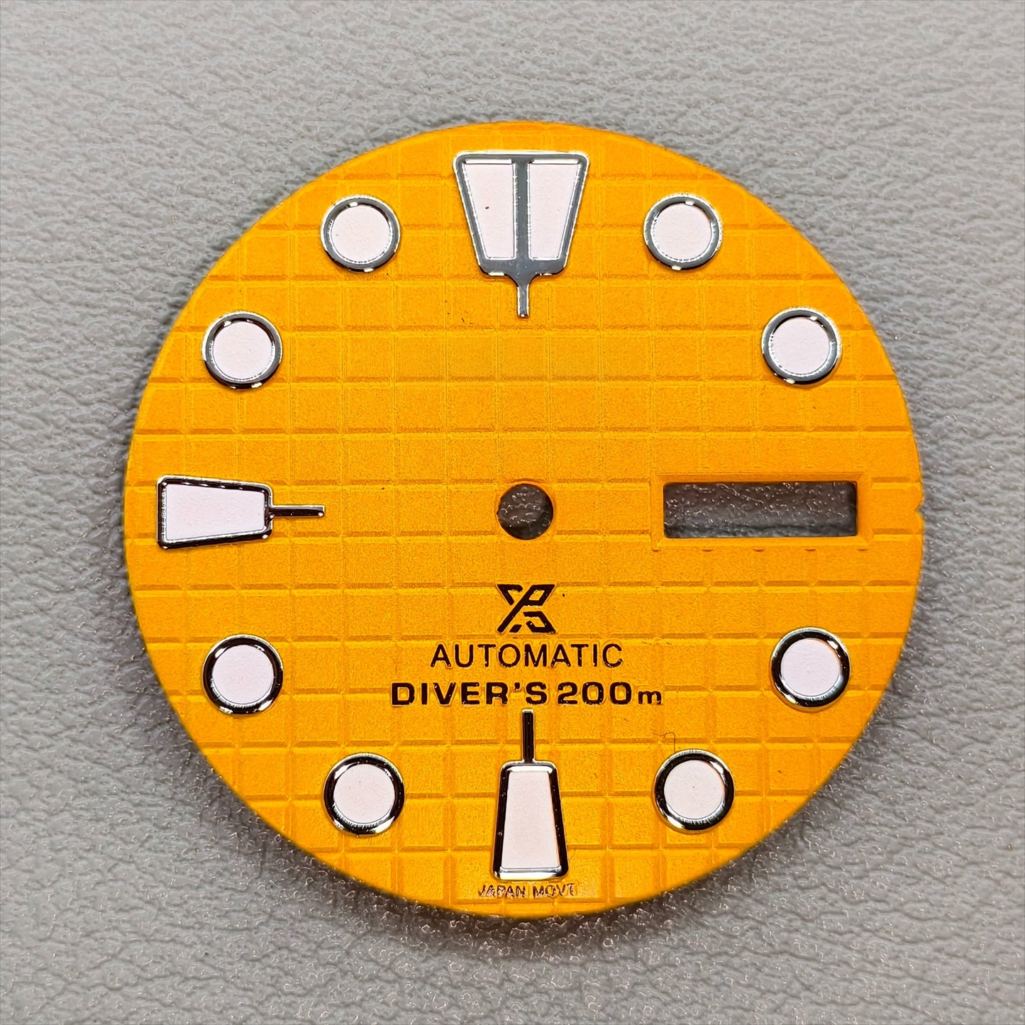 watch dial with S logo