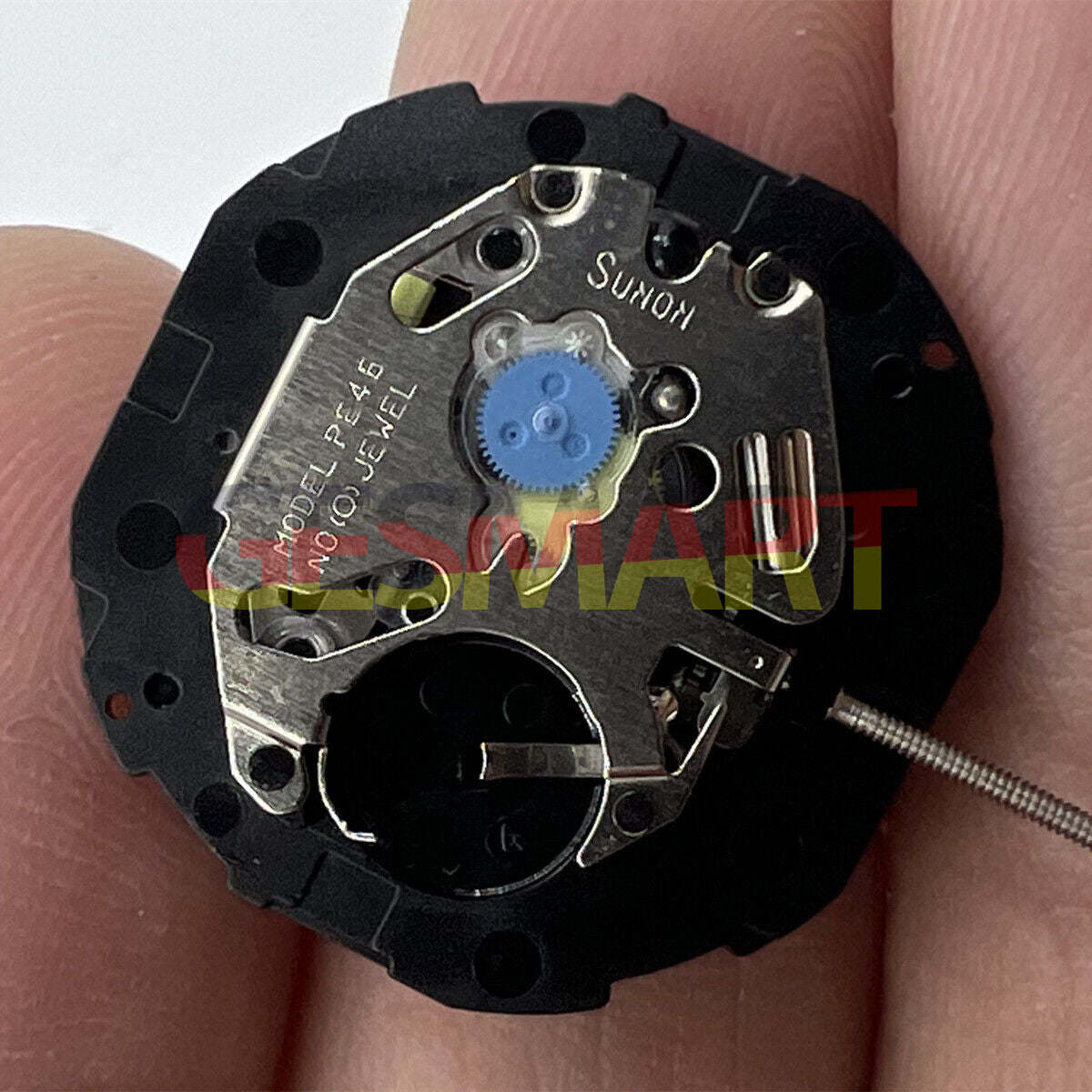 Sunon PE46 quartz watch movement with 2 hands and date display at 3 o'clock for precise timekeeping.