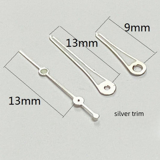 Silver-trimmed green lume watch hands set, 13x13x9mm, for Ronda 515 quartz movement timepieces.