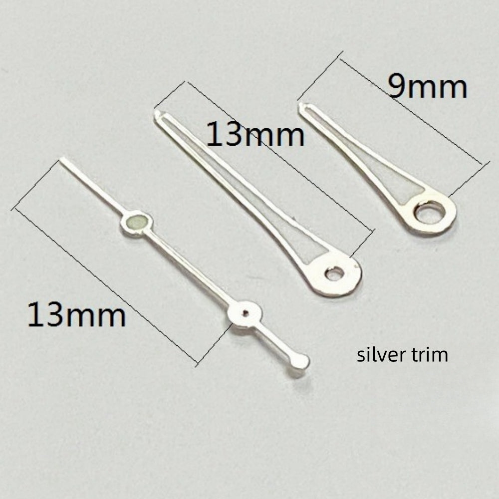 Silver trimmed green lume watch hands set for Ronda 515 quartz, enhancing visibility and style
