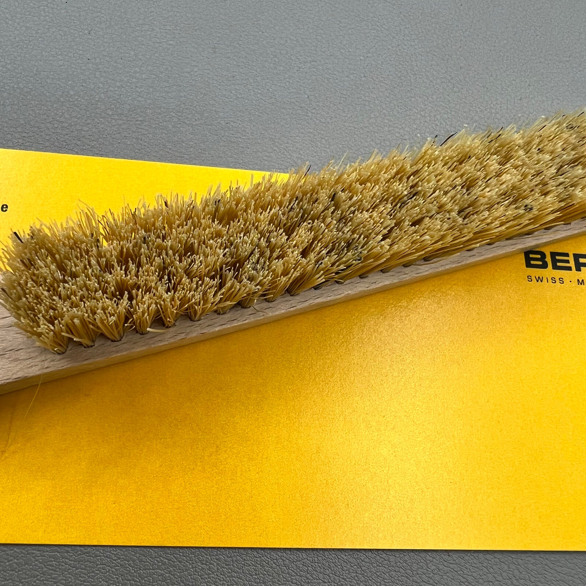 Swiss Bergeon 6377-2 hand brush with hard bristles for precise watch accessory cleaning.