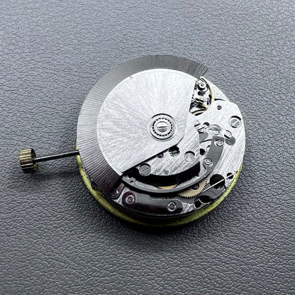 Shanghai 7750 mechanical watch movement with single calendar and small second at 9 o'clock, precision timekeeping.
