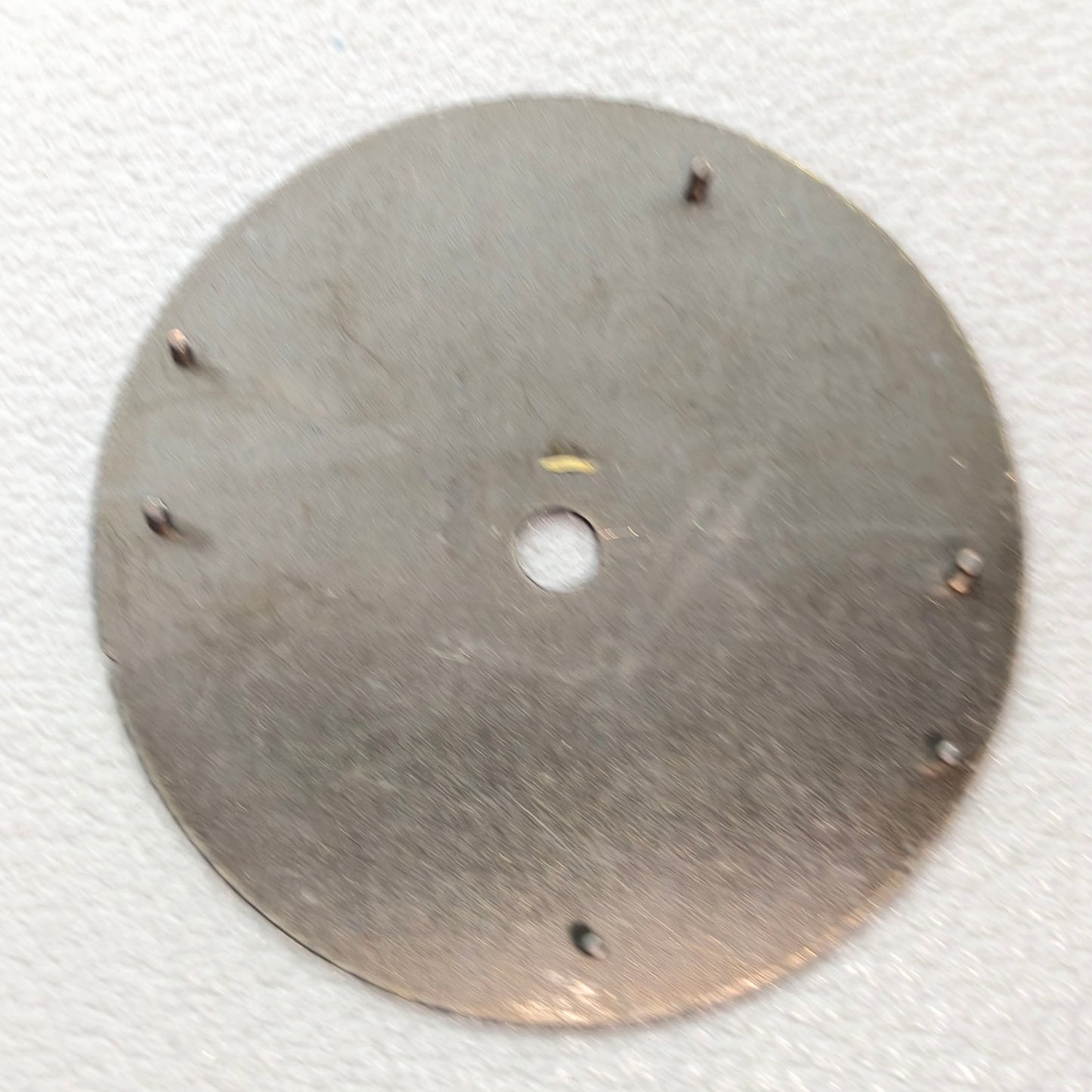 watch dial with R logo
