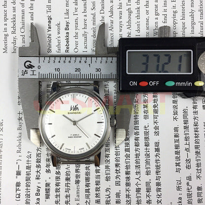 Shanghai 36mm manual mechanical watch 8120 with white dial, 17 jewels, classic Chinese craftsmanship by Shanghai brand.