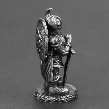 Hand-carved Vintage Viking Swordsman bronze figurine with silver and copper accents, collectible decor.