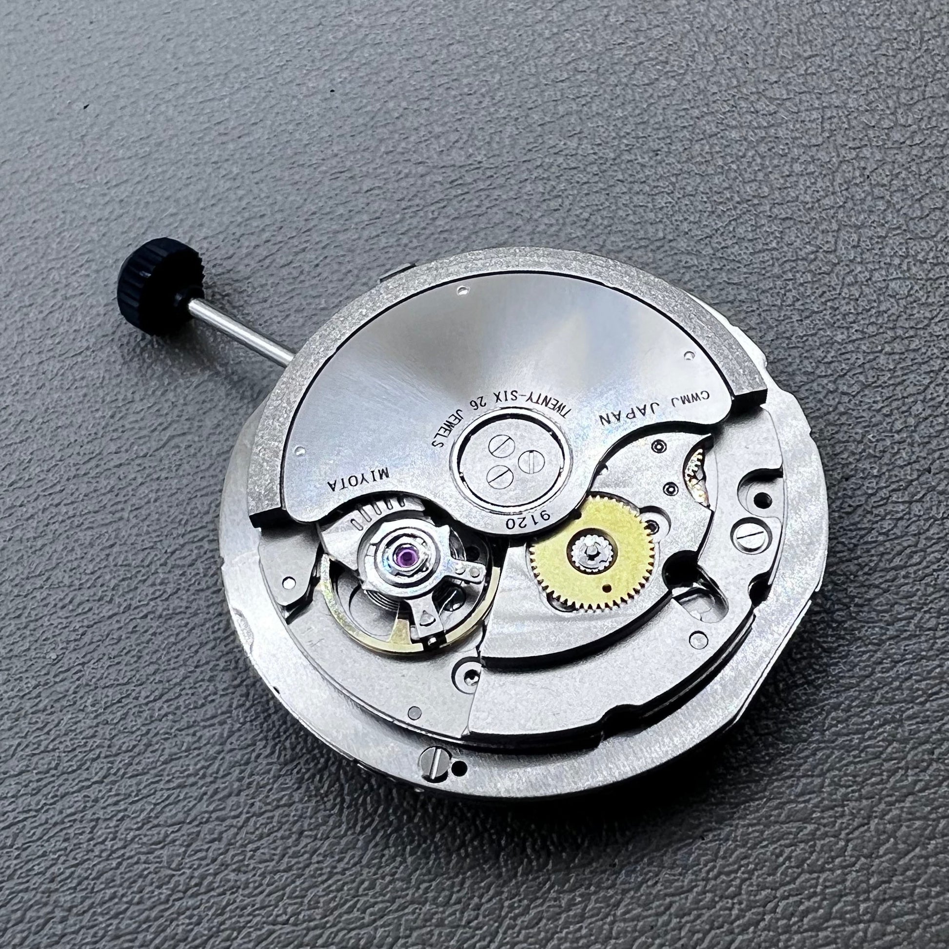 Close-up of Japan Miyota 9120 automatic mechanical watch movement showcasing precision craftsmanship.