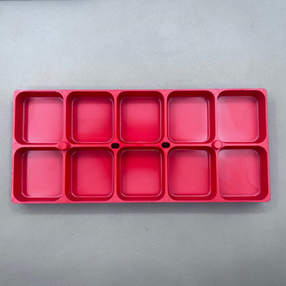 Swiss Horotec red plastic container with 10 compartments for organized watch accessory storage