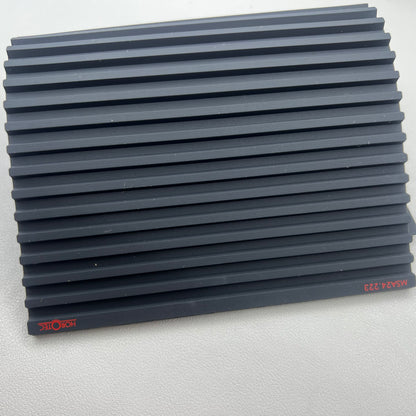 Swiss Horotec black silicon anti-slip bench mat with 32 grooves, ideal for watch repair tools organization.