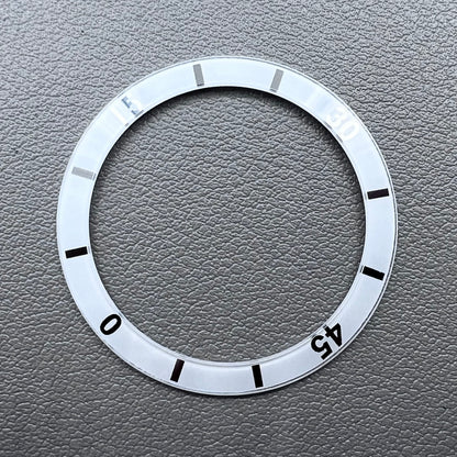 White 36mm ceramic watch bezel insert with numeral markings for men's and women's watches.