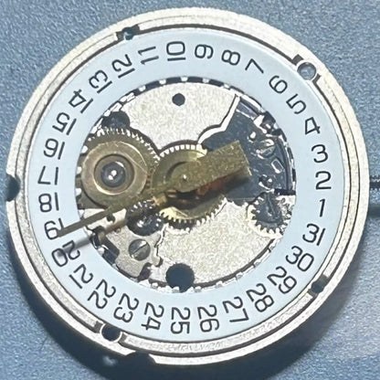 Swiss Made ETA 956.414 quartz watch movement with 3 hands and date display at 3 o'clock for precise timekeeping.