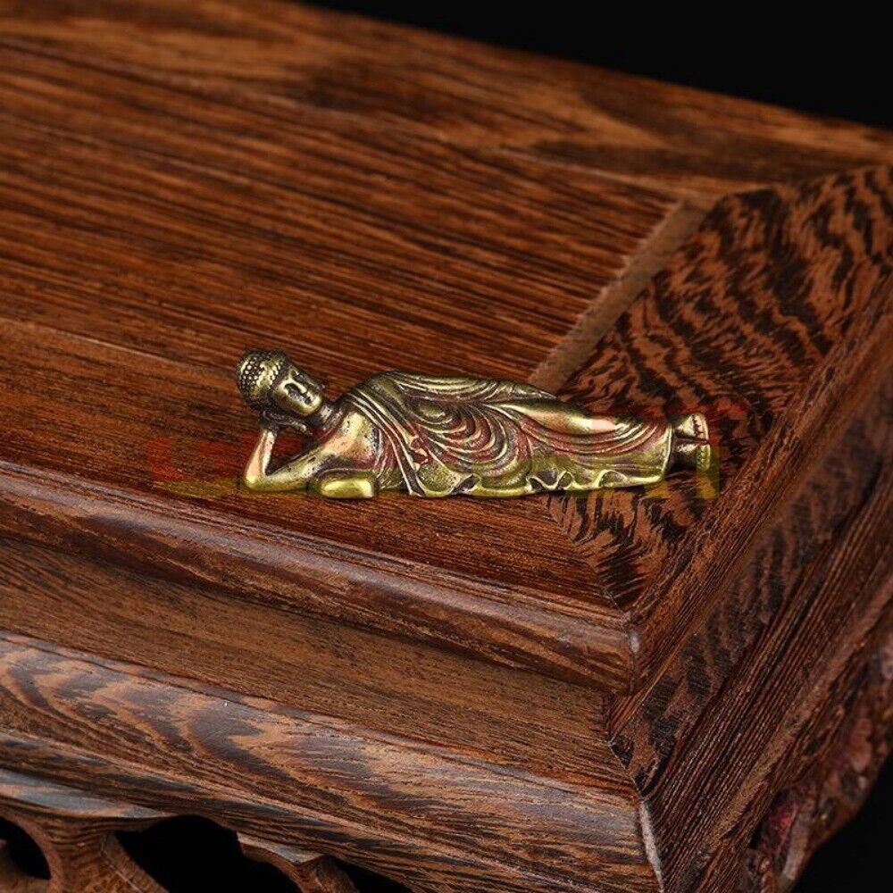 Hand-carved Copper Sleeping Buddha Shakyamuni figurine, ideal for meditation and spiritual decor.