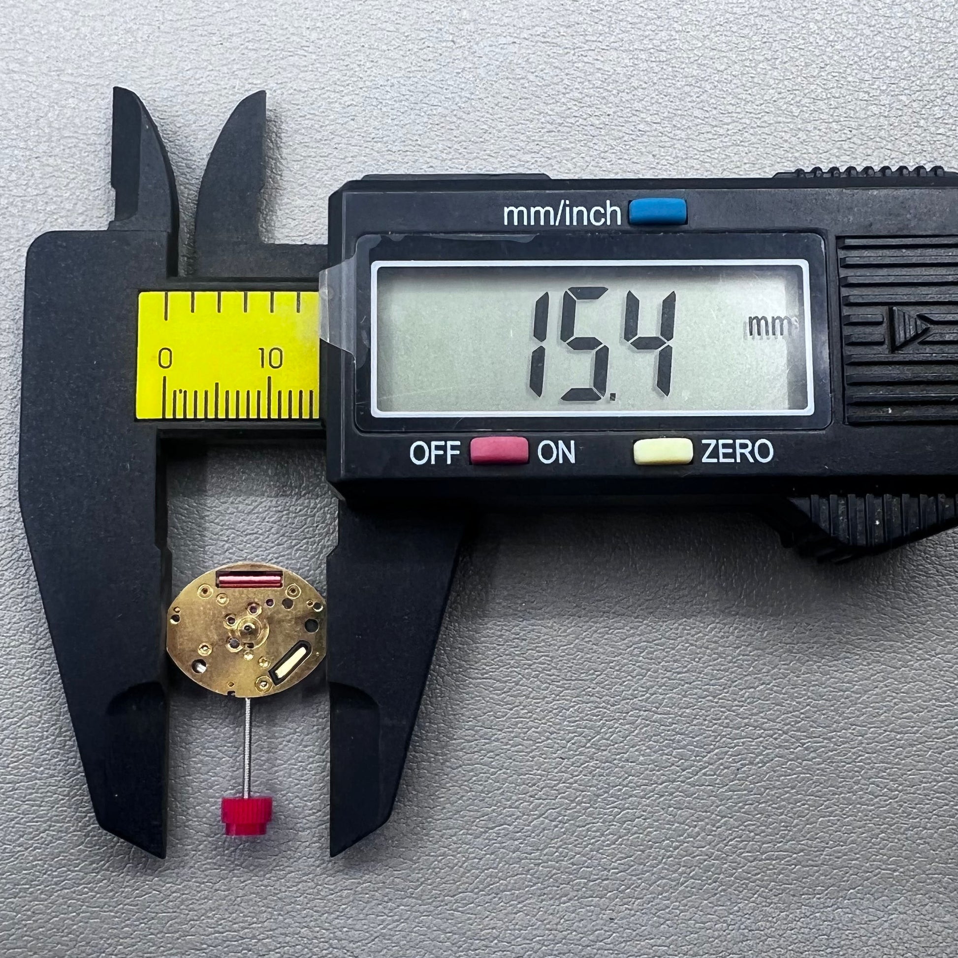 Close-up of Swiss ETA 980.103 quartz watch movement showcasing precision engineering and reliability.