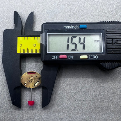 Close-up of Swiss ETA 980.103 quartz watch movement showcasing precision engineering and reliability.