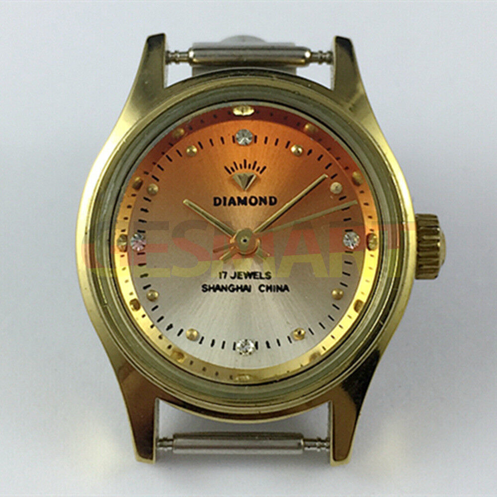 Shanghai Diamond 25mm lady watch with orange oval dial, manual mechanical movement, 17 jewels.