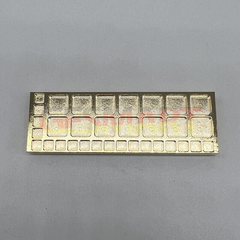 Copper golden 75mm tray with 33 square compartments, perfect for organizing screws in watch repair kits.