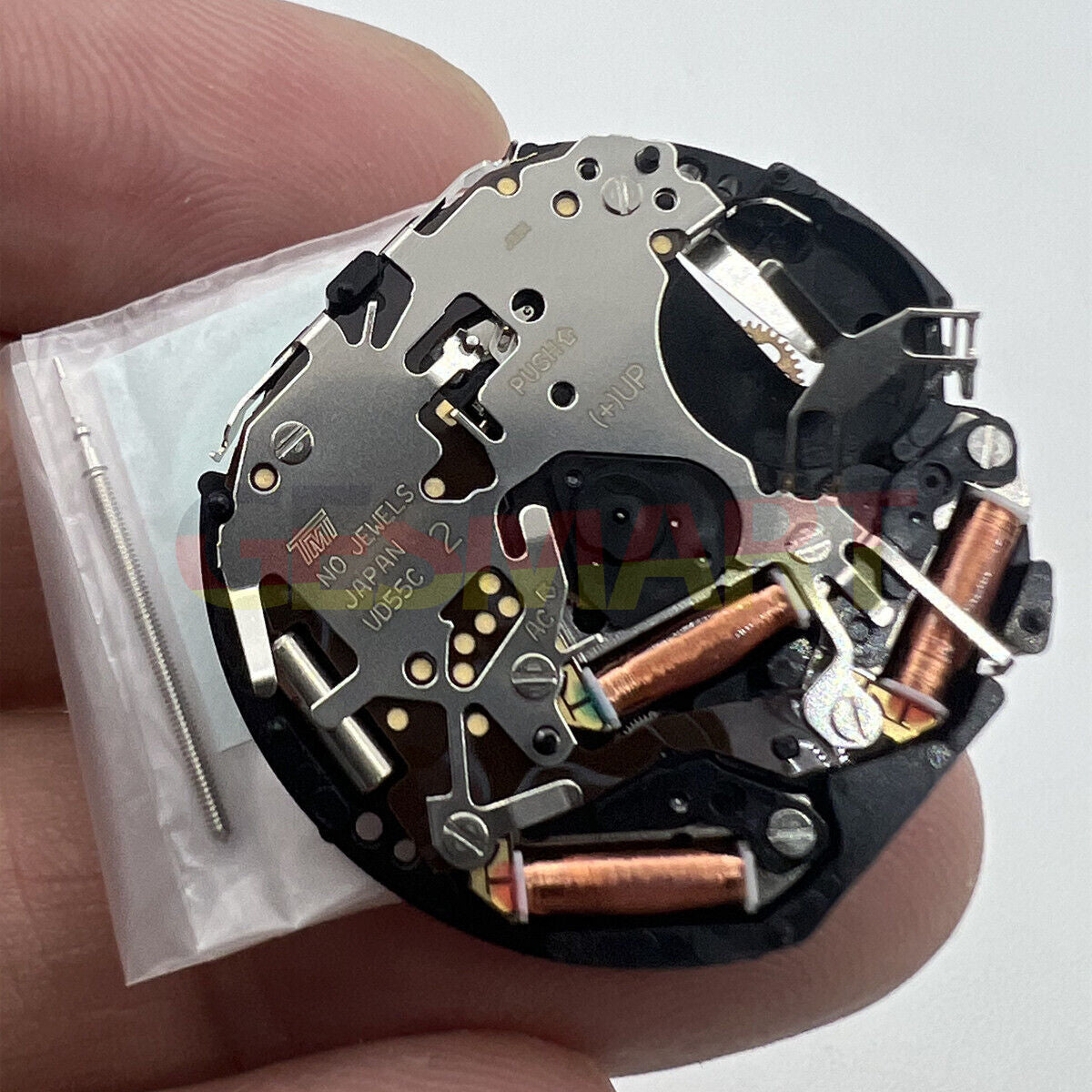 Hattori Epson VD55C quartz watch movement, precision-made in Japan for reliable timekeeping.