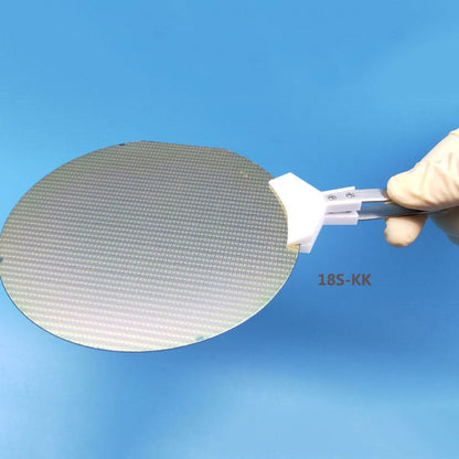 PTFE tweezers, heat resistant for safe watch repair and semiconductor wafer handling.