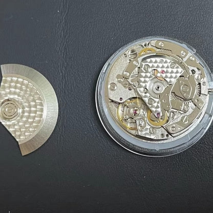 Asian 7750 automatic chronograph movement with day-date at 3 o'clock, precision ETA 7750 style.