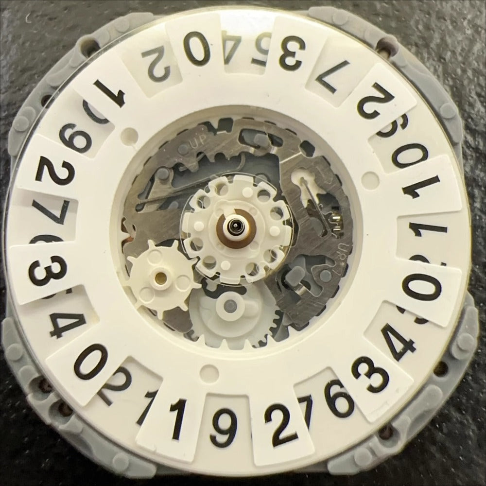 Original Japan Made VJ46A quartz movement watch part with date at 6 for single calendar models.