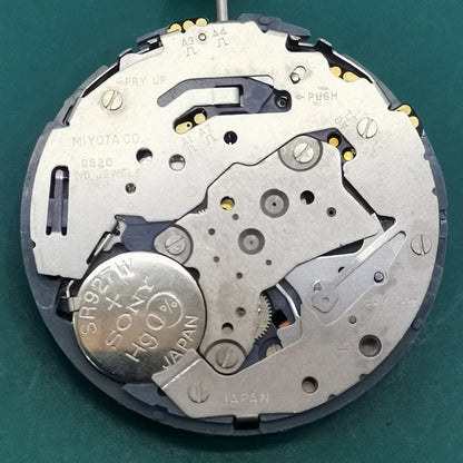 Japan Miyota OS20 quartz watch movement with date display at 4:30, precision-crafted for watchmakers.