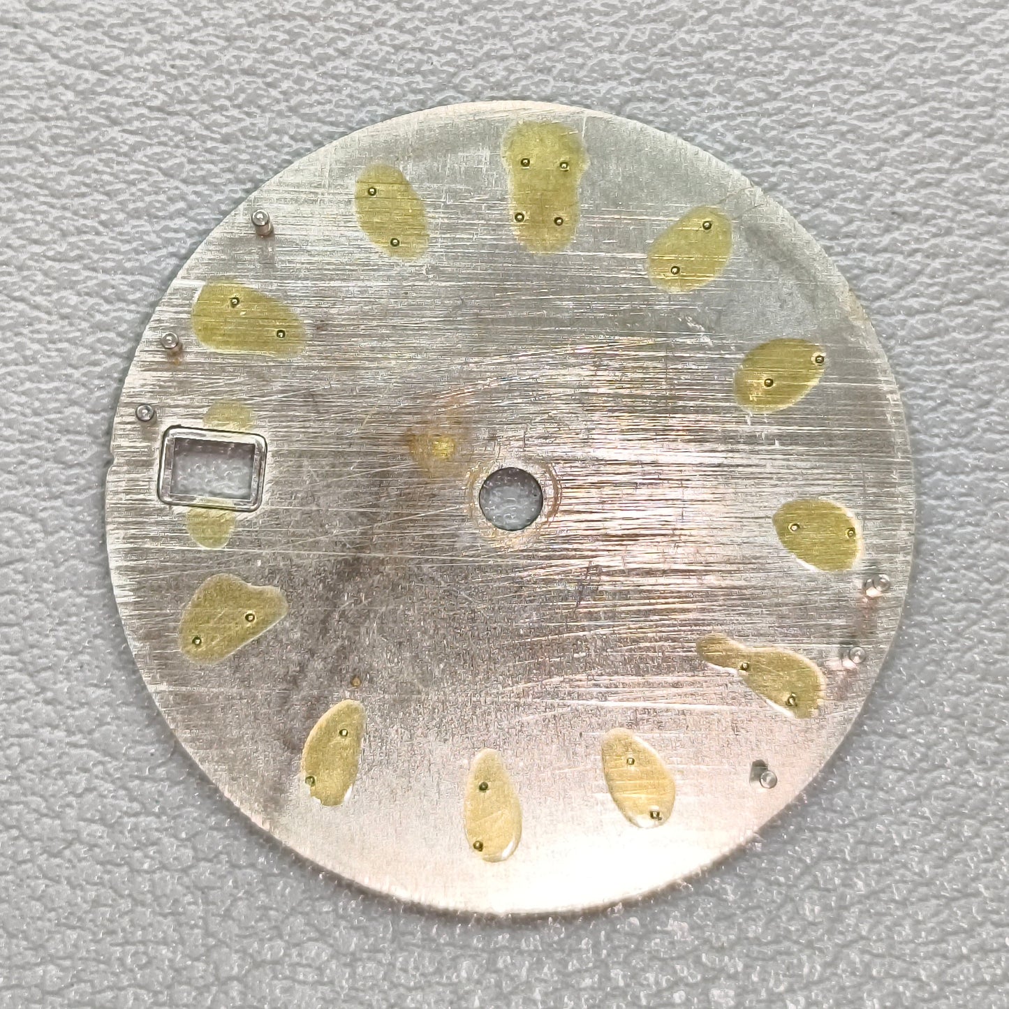 watch dial with S logo