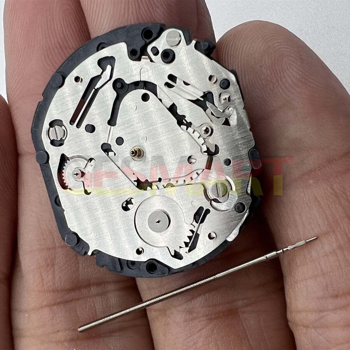 Hattori Epson TMI VX7J quartz watch movement with stem, precision Japanese craftsmanship for repairs and replacements.