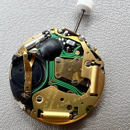 Swiss ISA 8162 golden watch disk with date feature, quartz movement replacement by ISA, ideal for watch repair.