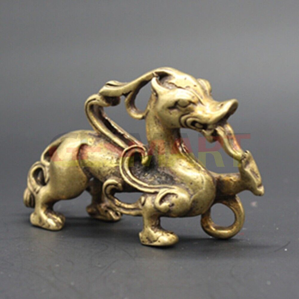 Solid copper dragon figurine with vintage bronze finish, detailed hand-carved design, collectible decor.