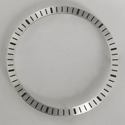 Silver watch chapter ring, 28.5x24.5mm, compatible with NH70 movement, enhancing dial detail.