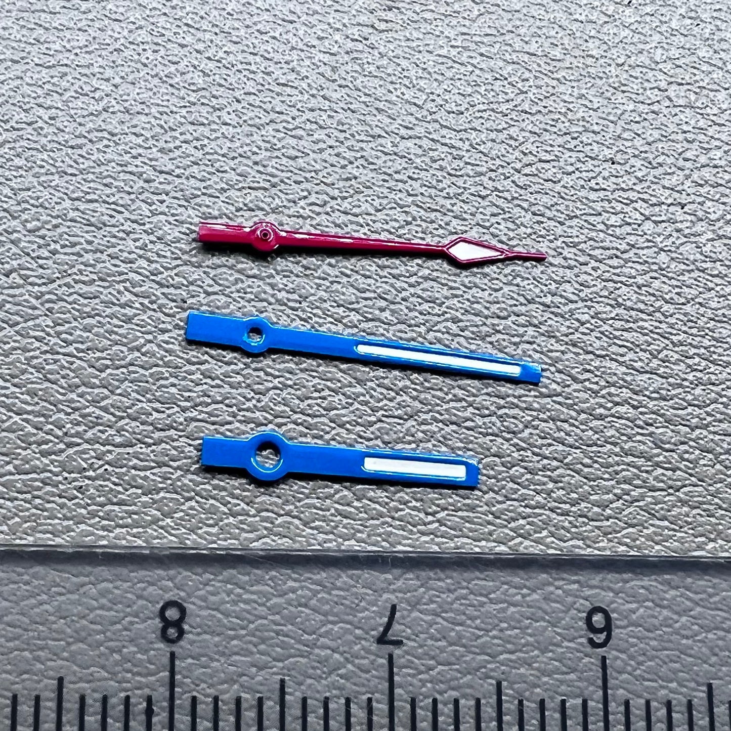 Blue and red trimmed 14mm watch hands with green lume for Ronda 515