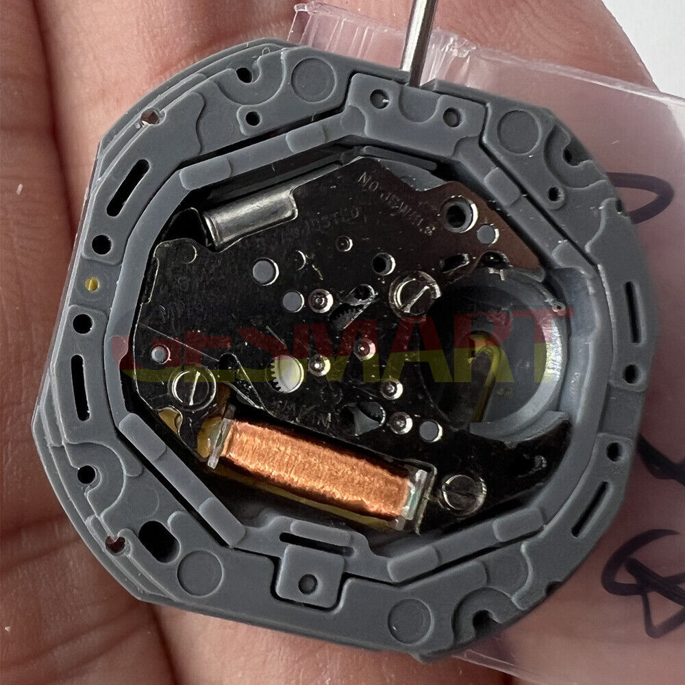 Genuine Miyota 6M50 quartz movement watch with golden dial and date at 3, branded precision timepiece.