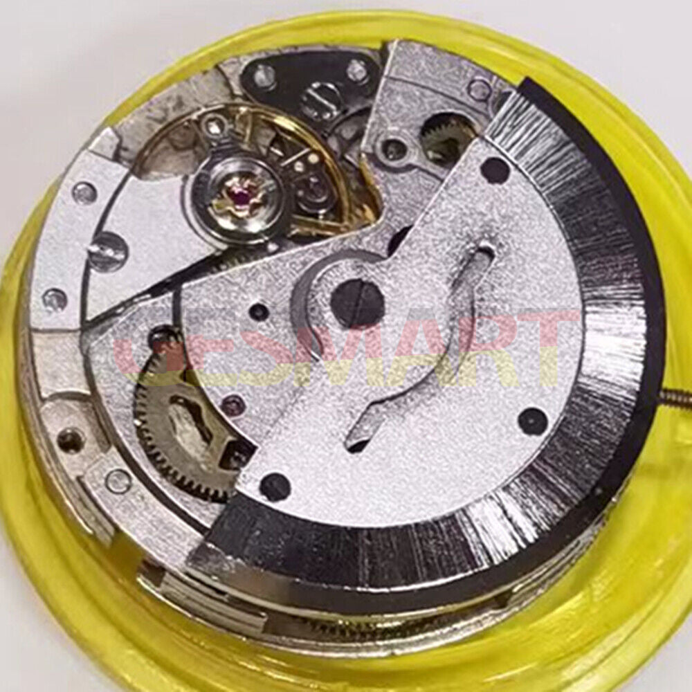 Asian Mingzhu 2813 automatic watch movement with single calendar and small second at 9 o'clock position.