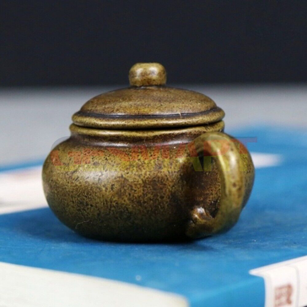 Solid copper teapot trinket, vintage hand-carved bronze figurine with intricate details.