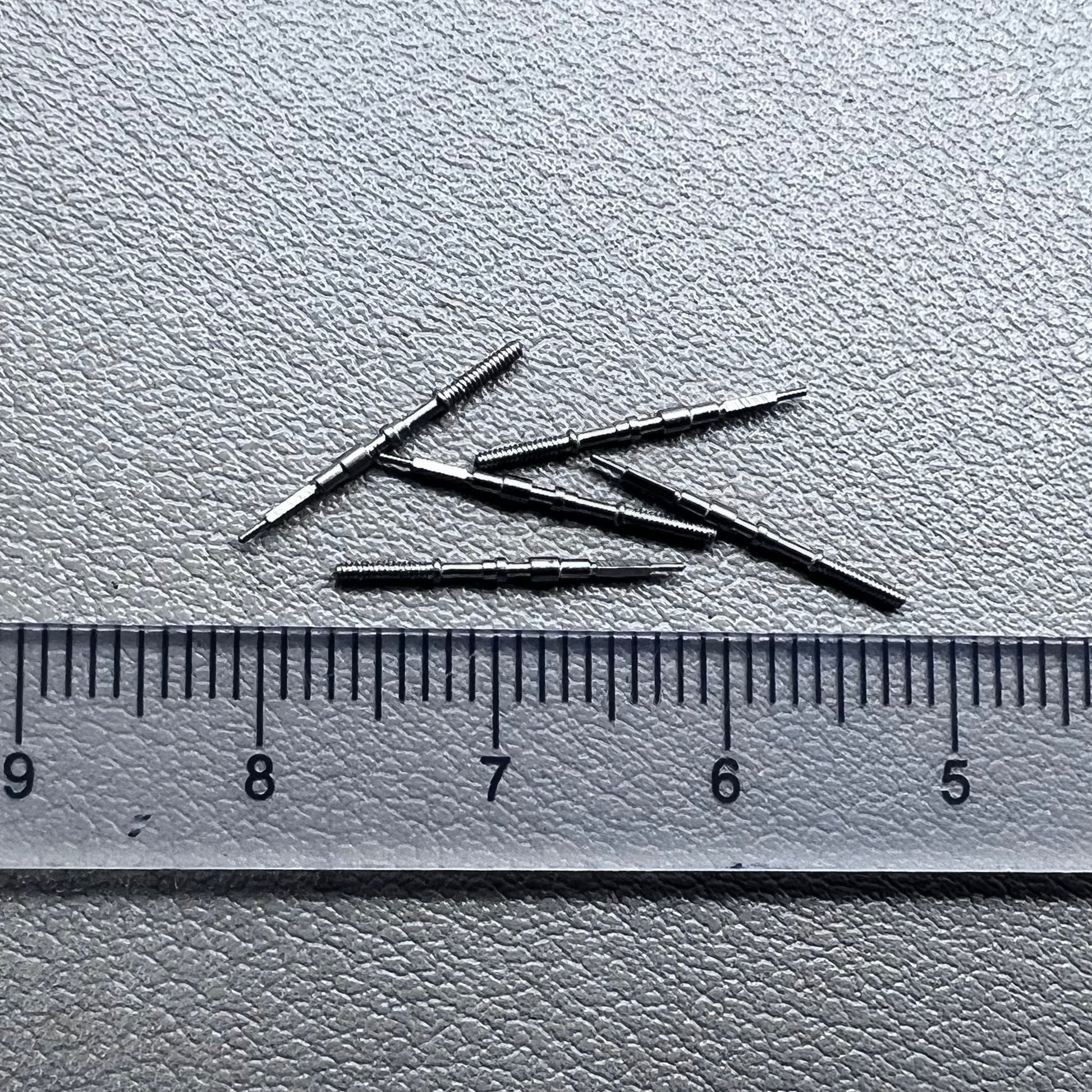 Set of 5 watch winding stems compatible with 7S26 automatic movement for mechanical watches.