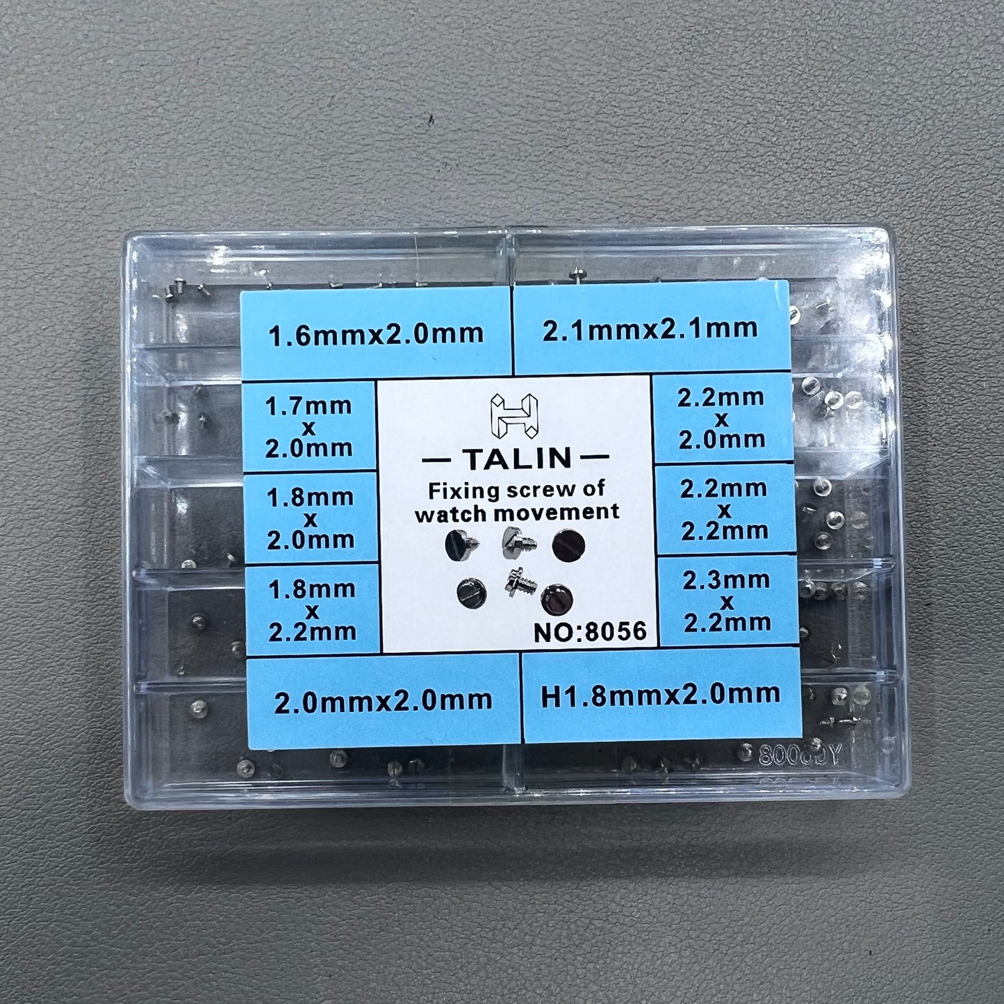 Replacement fixing screws for watch movements in assorted sizes, durable precision.