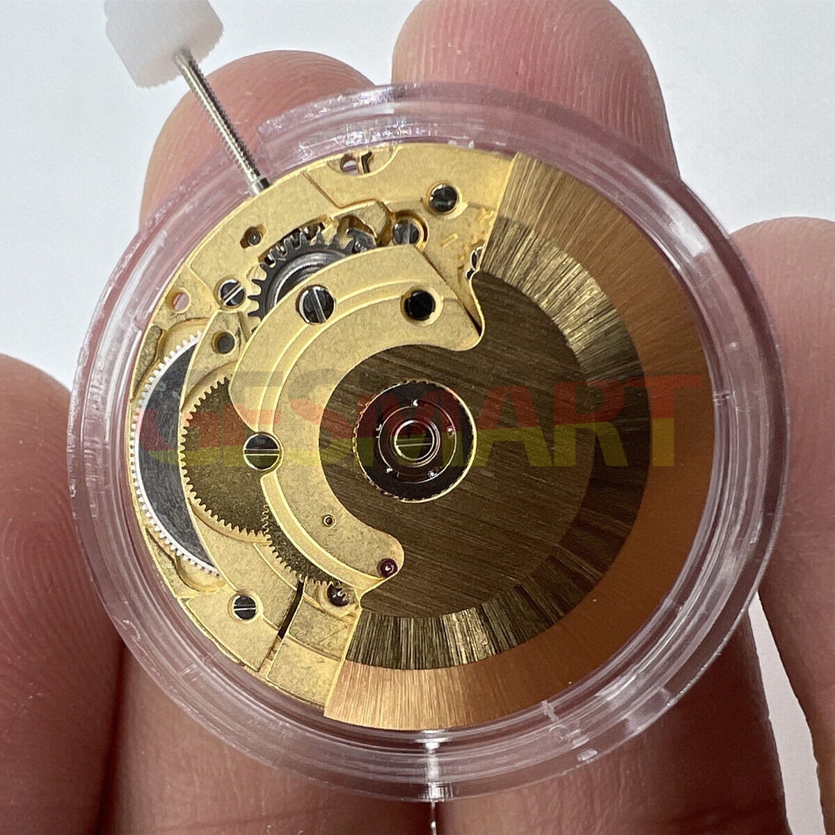 Close-up of Hangzhou HZ6460 mechanical watch movement with date at 3, China-made ETA2836 replacement for accessories.